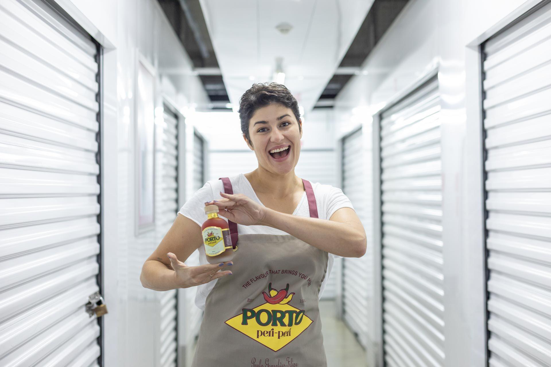 customer in the storage corridor promoting peri-peri sauce.